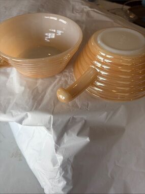 Fire king peach luster ovenware handled soup bowl
